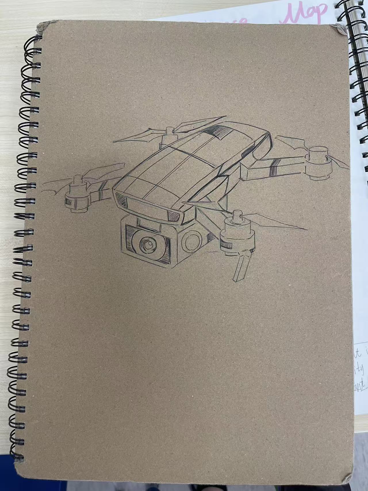 A drone drawn on an X Journal cover.